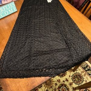 Beautiful black lace long skirt, flattering. Perfect for work, out or beach!!!